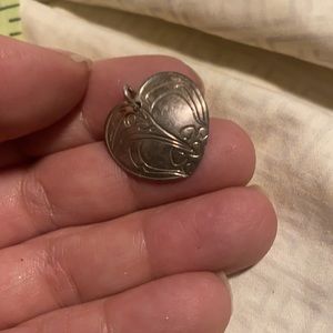 Indigenous silver carved hummingbird pendant